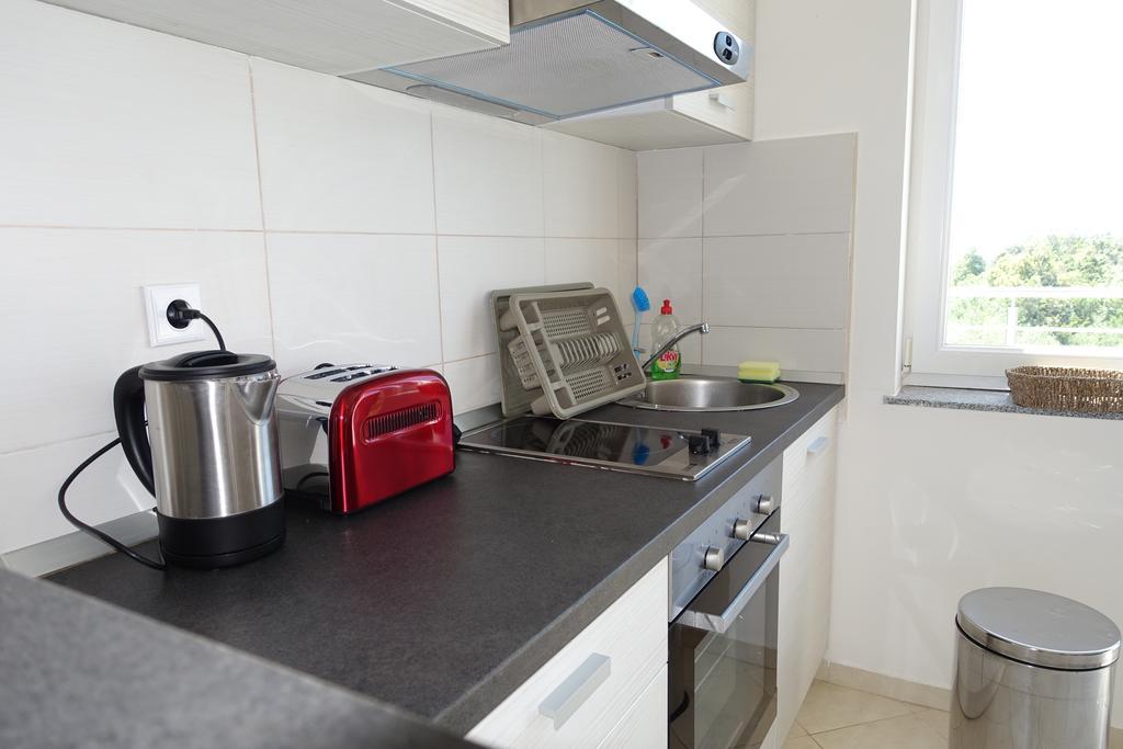 Olive Apartments Углян Экстерьер фото